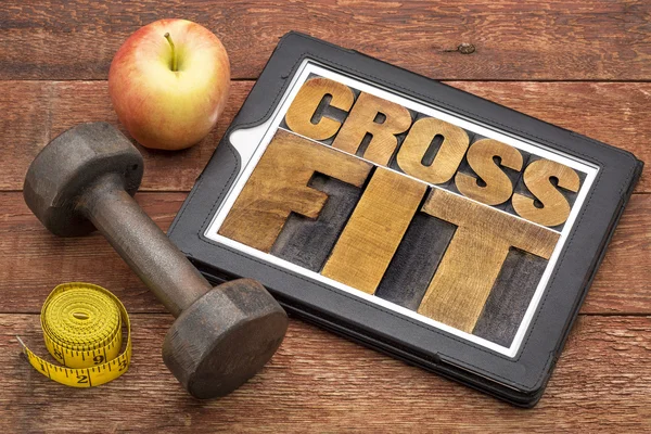 Palabra crossfit abstracta en tableta — Foto de Stock