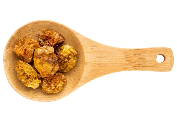 Dried goldenberries on wooden spoon — Stock Photo, Image