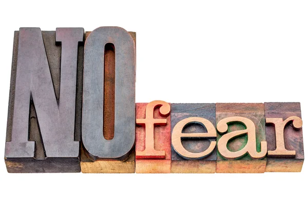 NO fear word abstract in wood type — Stock Photo, Image