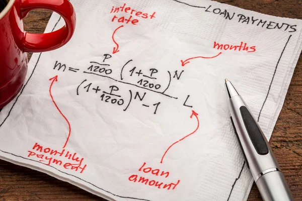 Loan payment equation on napkin — ストック写真