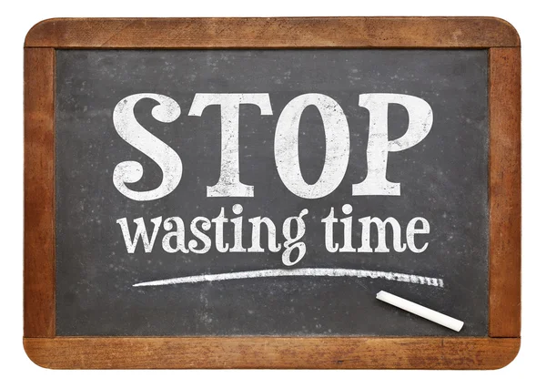 Stop wasting time blackboard sign — 스톡 사진