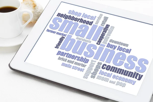 Nube palabra pequeña empresa en la tableta — Foto de Stock