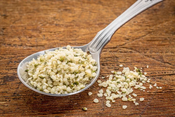 Tablespoon of hemp seed hearts — Stock Photo, Image