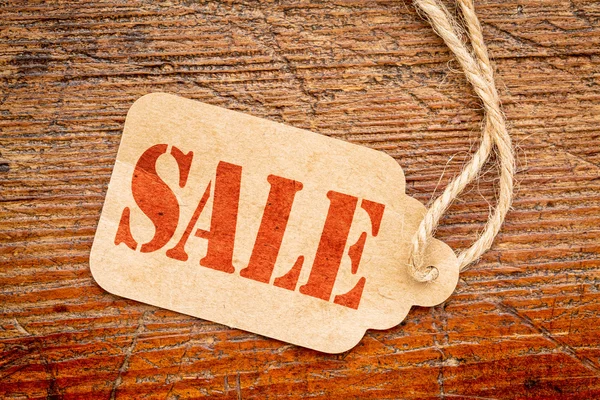 Sale sign  on a price tag — Stockfoto
