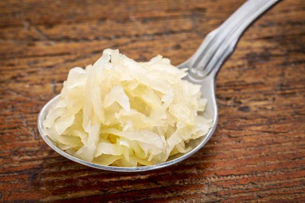 Tablespoon of sauerkraut — Stock Photo, Image