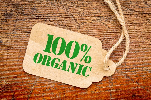 One hundred percent organic sign  on a price tag — Stock Photo, Image