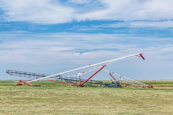 Grain conveyors in agriculture landscape — Stok fotoğraf