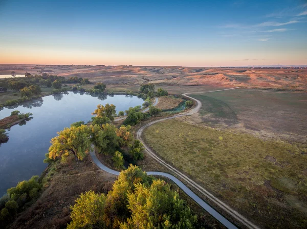 Nascer do sol sobre a trilha do rio poudre — Fotografia de Stock