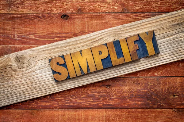 Simplify word - rustic sign — Stock Photo, Image