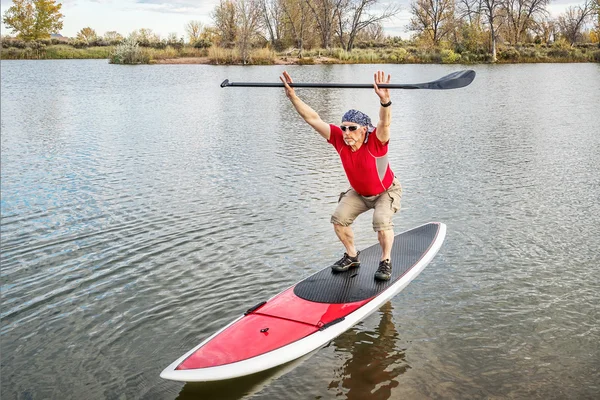 Fitness en stand up paddleboard — Foto de Stock