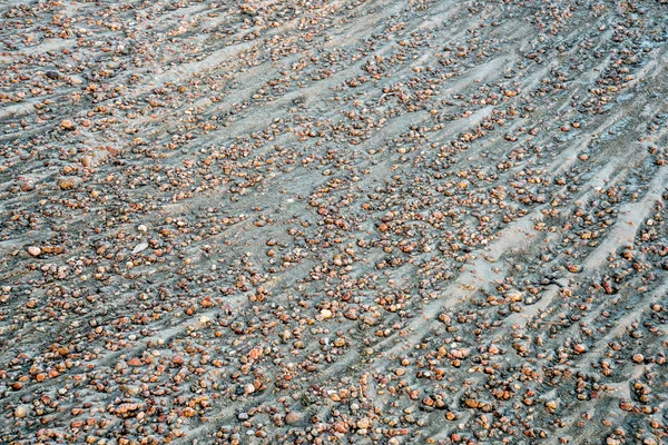 Floden gravelbar textur och mönster — Stockfoto