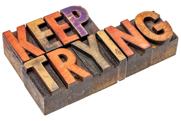 Keep trying words in wood type — Stock Photo, Image