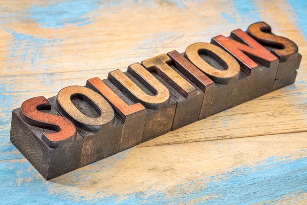 Solutions banner in wood type — Stock Photo, Image