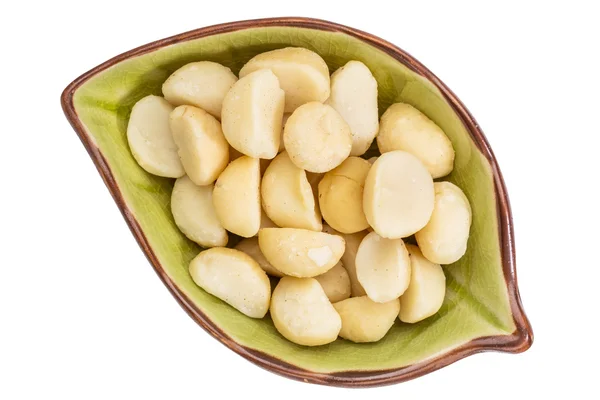 Macadamia nuts in a bowl — Stock Photo, Image