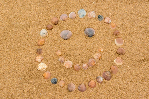 Happy face on the beach — Stock Photo, Image