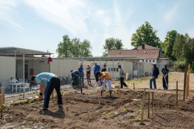 Bir Alman mülteci kampında Bahçe etkinlikleri