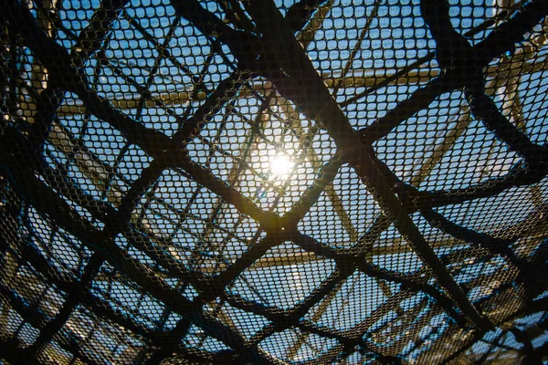 Abstract net texture against sunlight — Stock Photo, Image