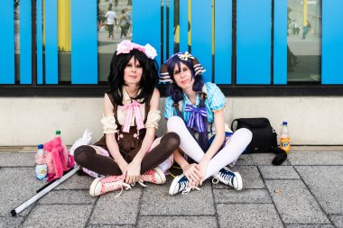 Comic Con Almanya Stuttgart sırasında dinlenme cosplayers