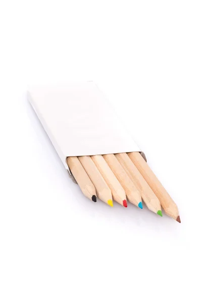 Vários lápis de cor na caixa no fundo branco — Fotografia de Stock