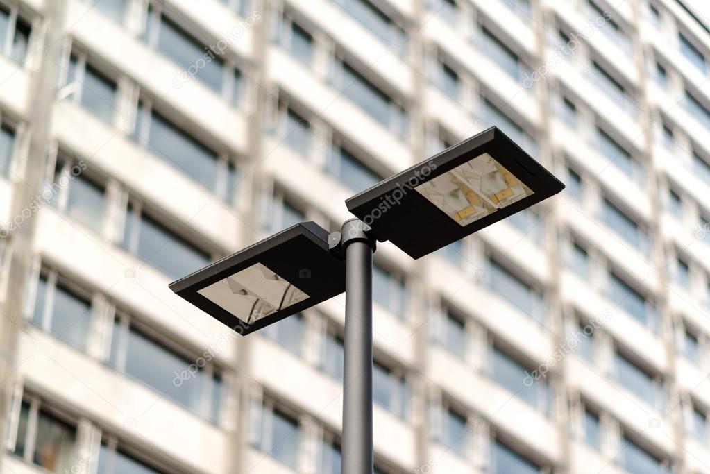 Modern streetlamp and concrete building