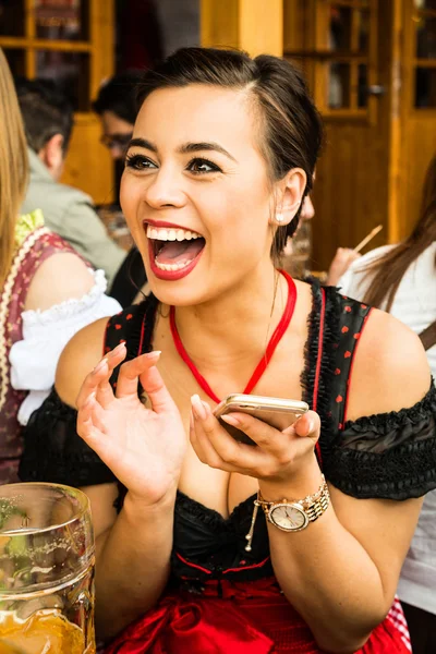 Girl drinking beer at Oktoberfest — Stock Photo, Image