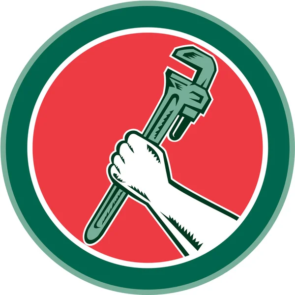Ayarlanabilir anahtarı daire gravür tutan el — Stok Vektör