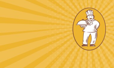 Şef baker yemek tabağı ile