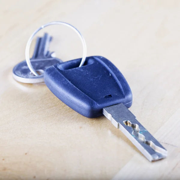 Car key over wooden background — Stock Photo, Image