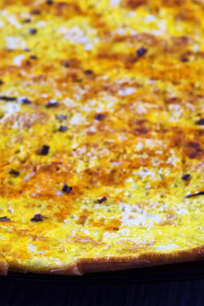 Omelette over black background — Stock Photo, Image