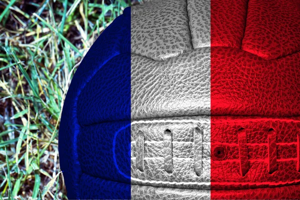 France flag over vintage football — Stock Photo, Image