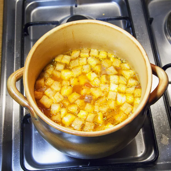 Pot with soup — Stock Photo, Image