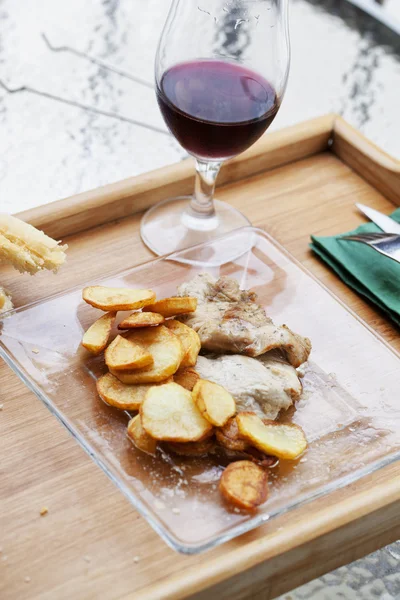 Meat, potatoes and wine — Stock Photo, Image