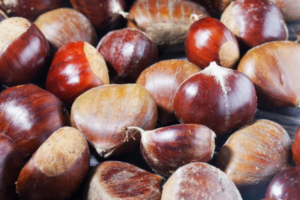 Chestnuts in strict close up, horizontal image Stock Picture