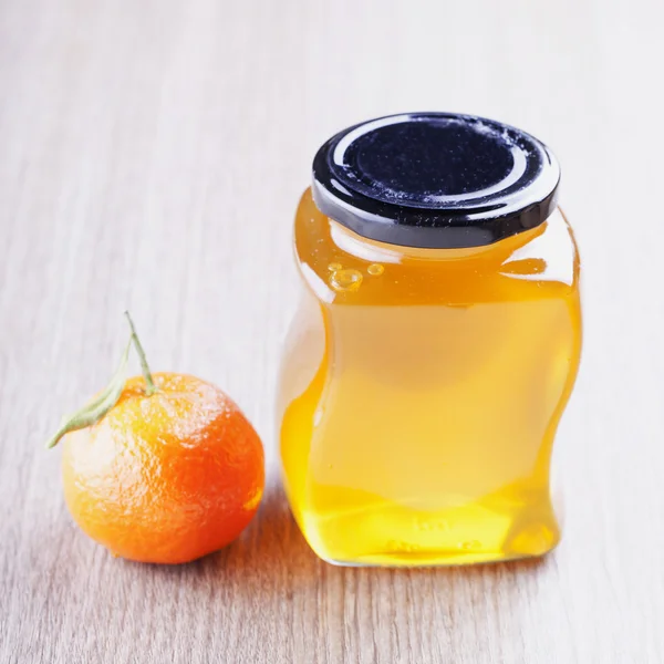 Honig und Mandarine — Stockfoto