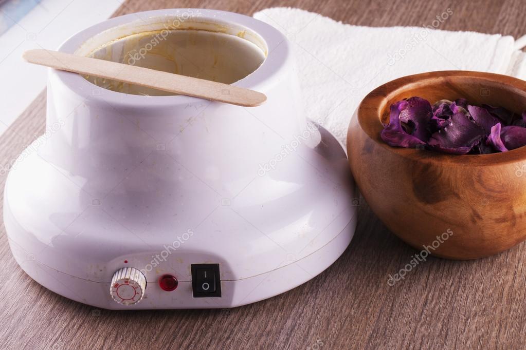 Wax heater over wood — Stock Photo © Koufax73 90899502