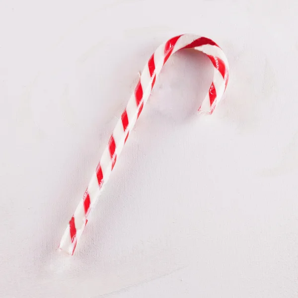 Bastón de caramelo sobre blanco —  Fotos de Stock
