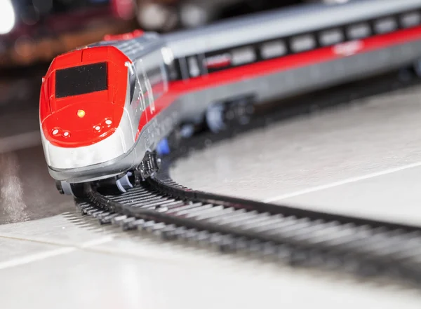 Toy train over railway — Stock Photo, Image