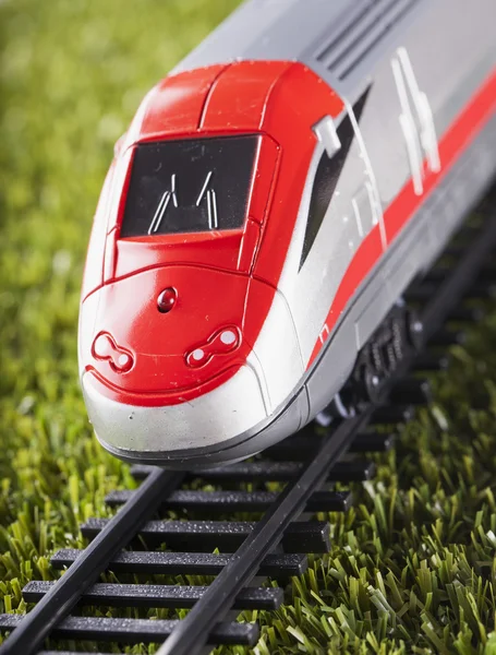 Toy train over railway — Stock Photo, Image