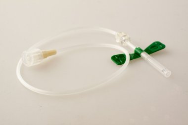 Kelebek iğne beyaz arka plan üzerinde