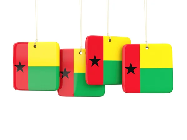 Kvadratiska etiketter med guinea Bissaus flagga — Stockfoto