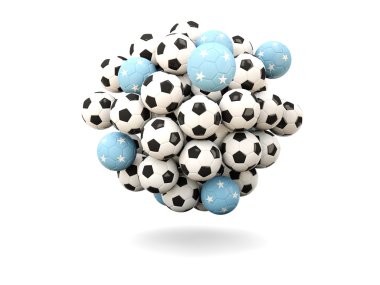 Futbol topları yığını Mikronezya bayrağı ile