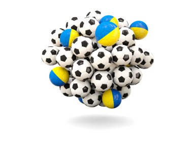 Futbol topları yığını ile Ukrayna bayrağı