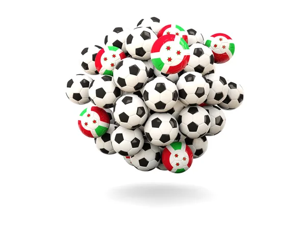 Pilha de bolas de futebol com bandeira do Burundi — Fotografia de Stock