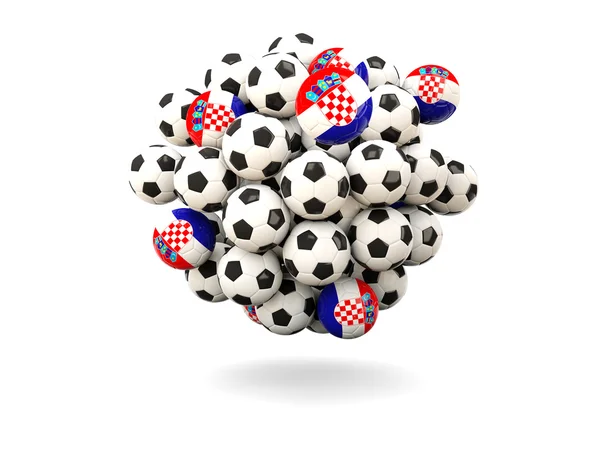 Mucchio di palloni da calcio con bandiera di croazia — Foto Stock