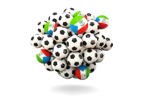 Hög med fotbollar med flagga Ekvatorialguinea — Stockfoto
