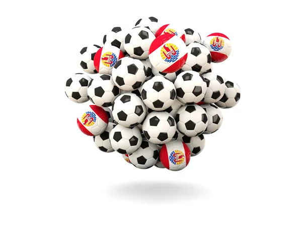 Hromadu fotbaly s příznakem Francouzské Polynésie — Stock fotografie