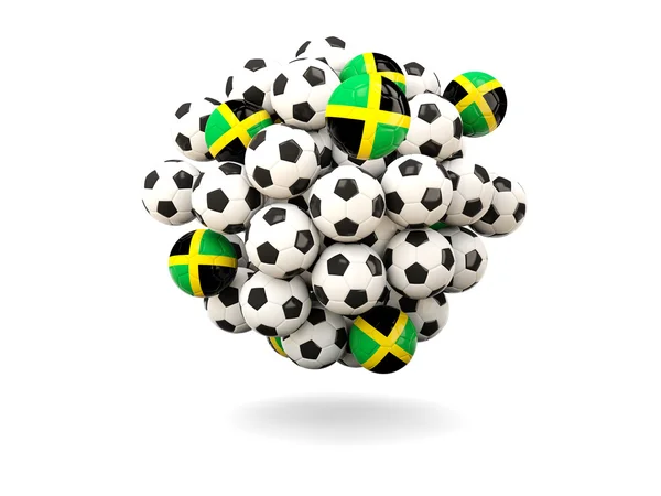 Montón de balones de fútbol con bandera de jamaica —  Fotos de Stock