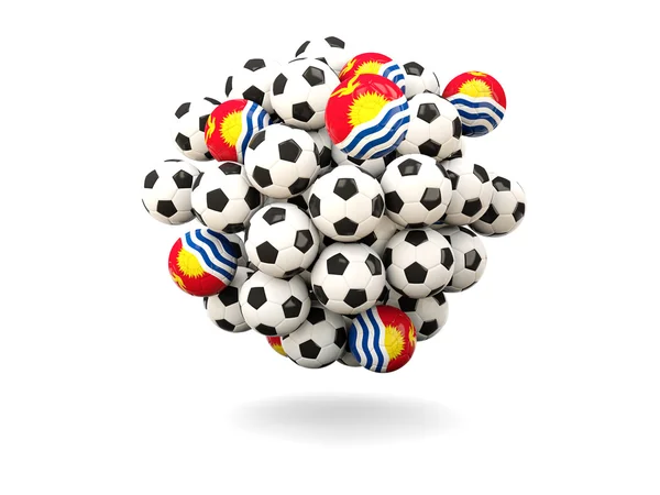 Hög med fotbollar med flagga kiribati — Stockfoto