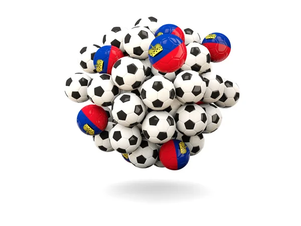 Montón de balones de fútbol con bandera de Liechtenstein — Foto de Stock