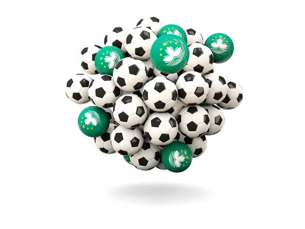 Montón de balones de fútbol con bandera de macao — Foto de Stock